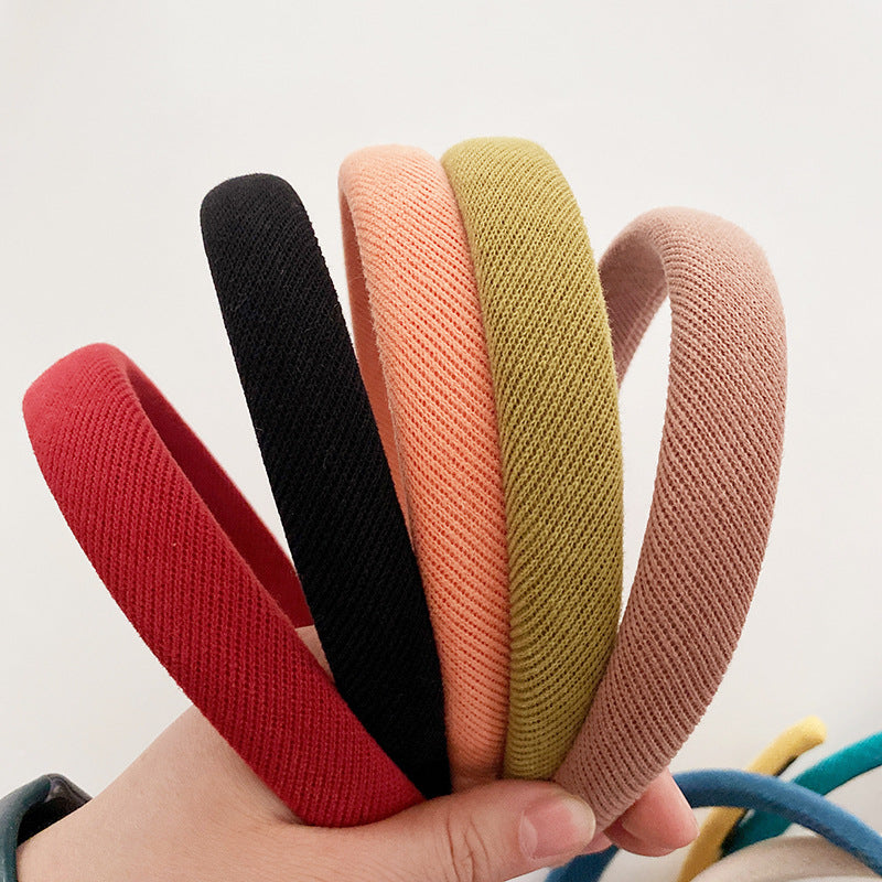 Set of nine solid color cloth headbands for babies and girls in various bright shades — view 2