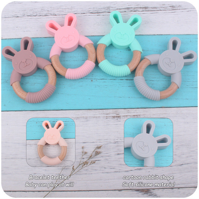 Wooden rabbit teething rattle with food-grade silicone beads in various colors for baby gum relief