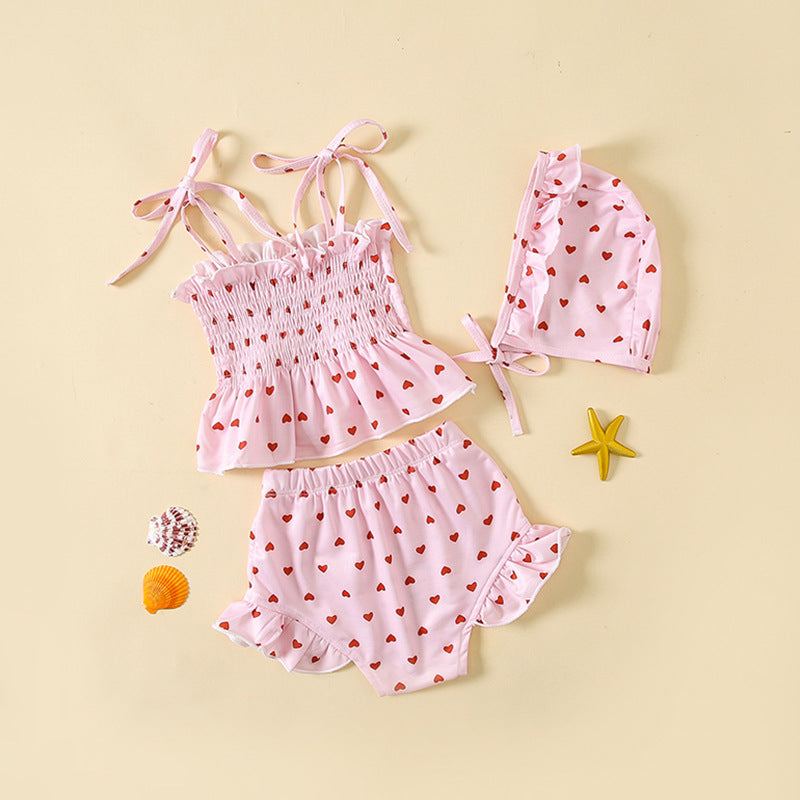 Girls heart pattern swimwear set in bright pink featuring a comfortable quick-drying two-piece toddler swimsuit — view 2