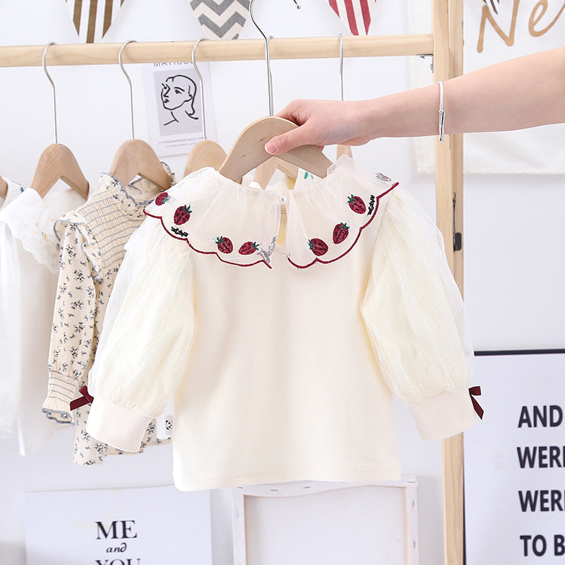 Baby girl apricot cotton shirt with strawberry embroidery, puff sleeves, and front bow patch — view 2