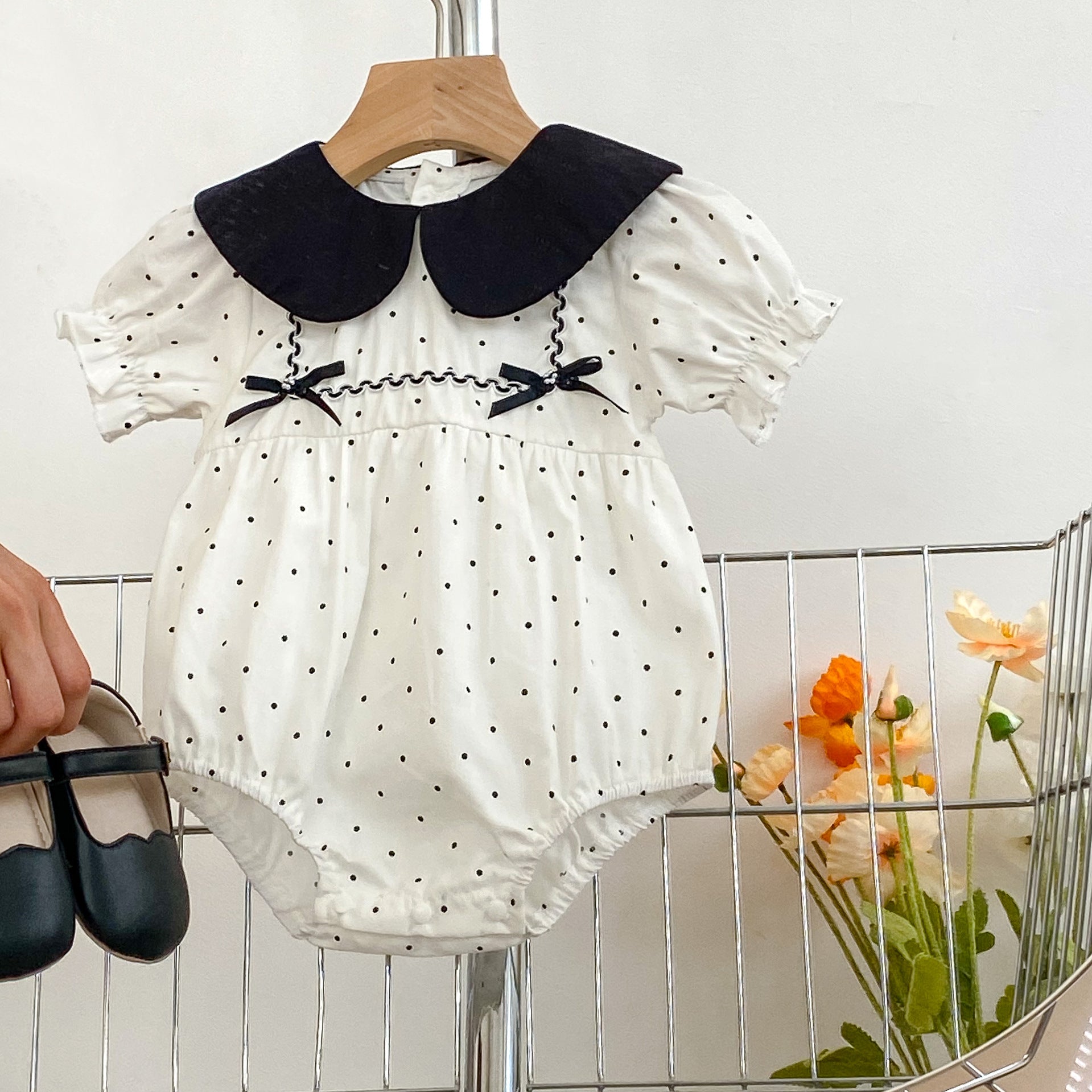 Baby girl polka dot bodysuit in soft white summer cotton with a stylish doll neck — view 3