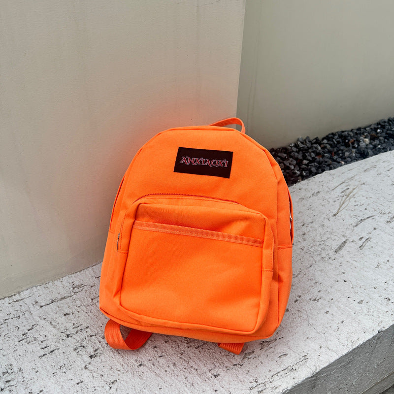 Lightweight children's canvas backpack with letter pattern available in multiple vibrant colors — view 3