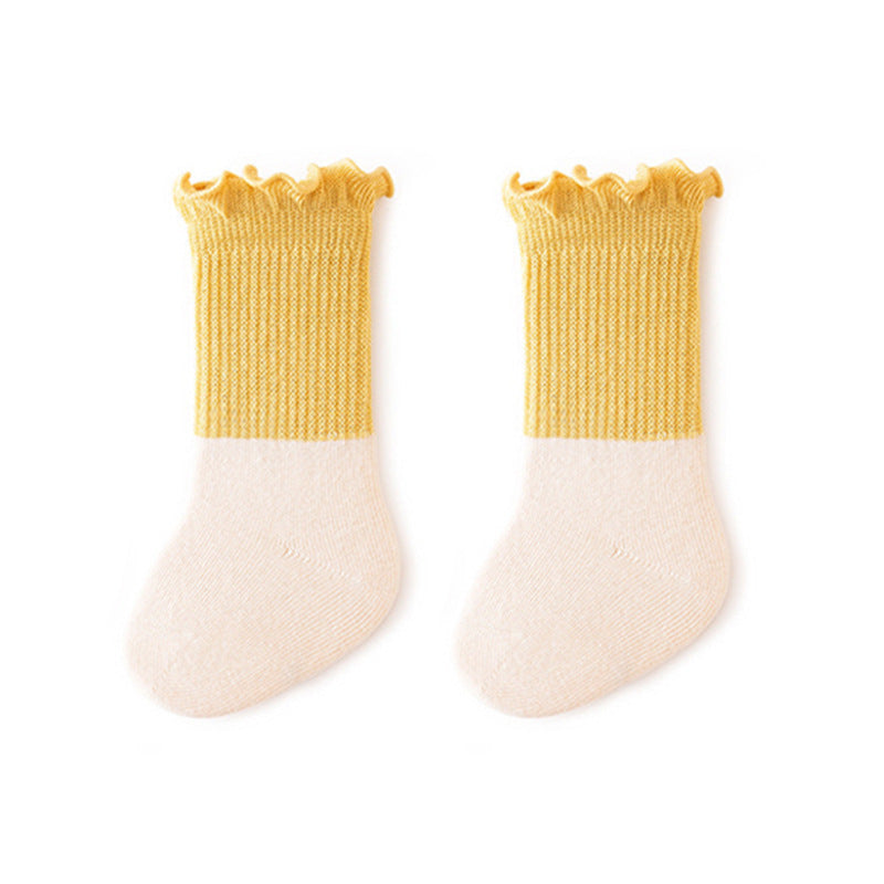Unisex baby patchwork ruffle crew socks in bright colors, made of a soft cotton blend. — view 3