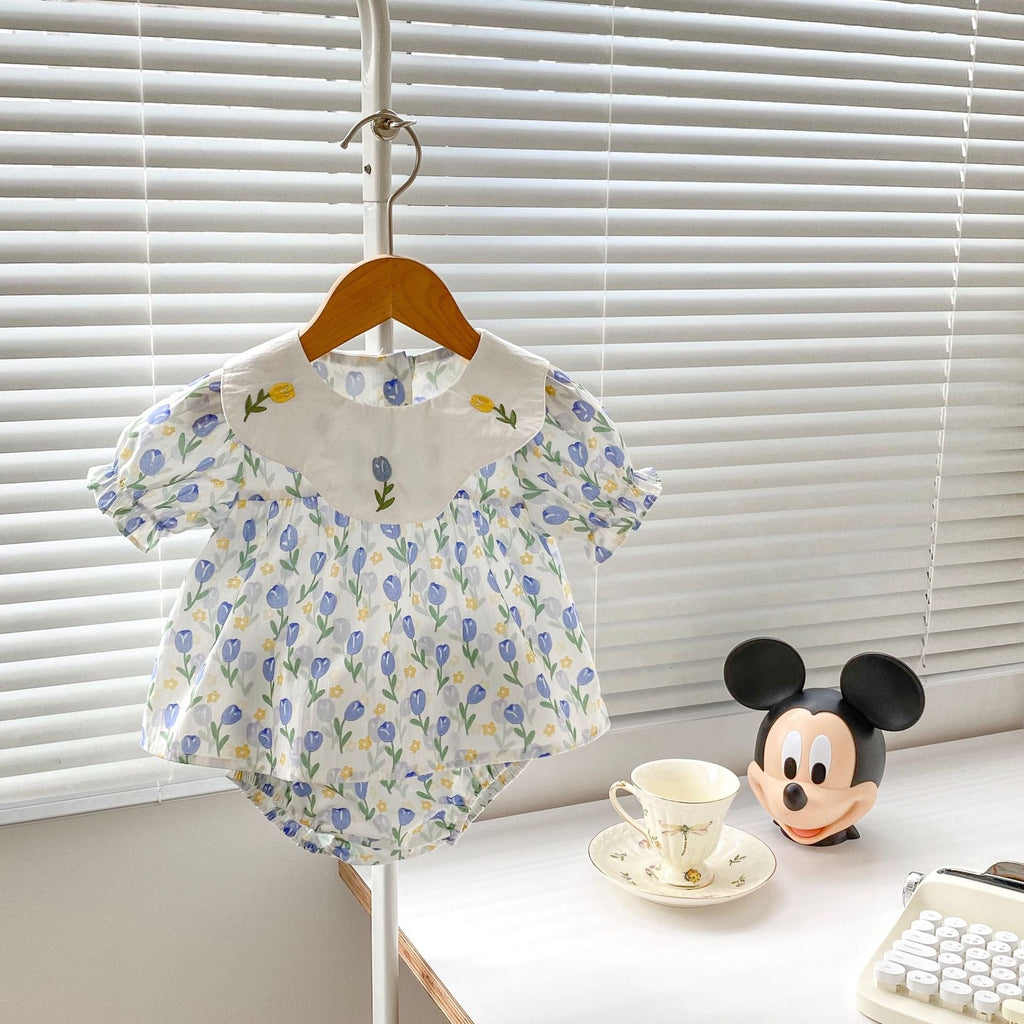 Blue cotton baby clothing set with floral embroidered doll neck top and matching shorts — view 3
