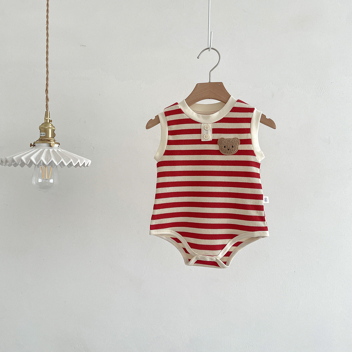 Unisex sleeveless baby bodysuit featuring a striped pattern and teddy bear motif in soft cotton. — view 5