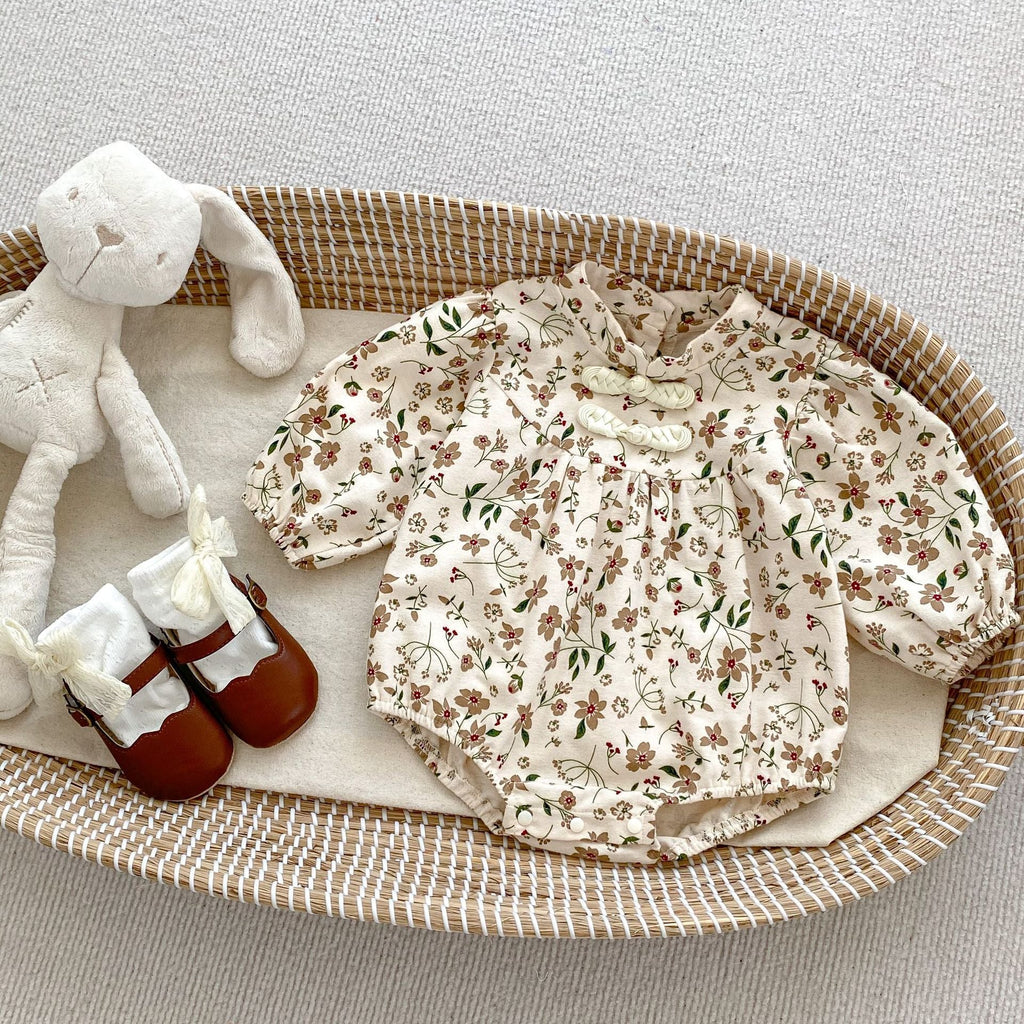 Brown long-sleeve cotton baby bodysuit with vibrant autumn floral pattern and traditional Chinese style details. — view 2