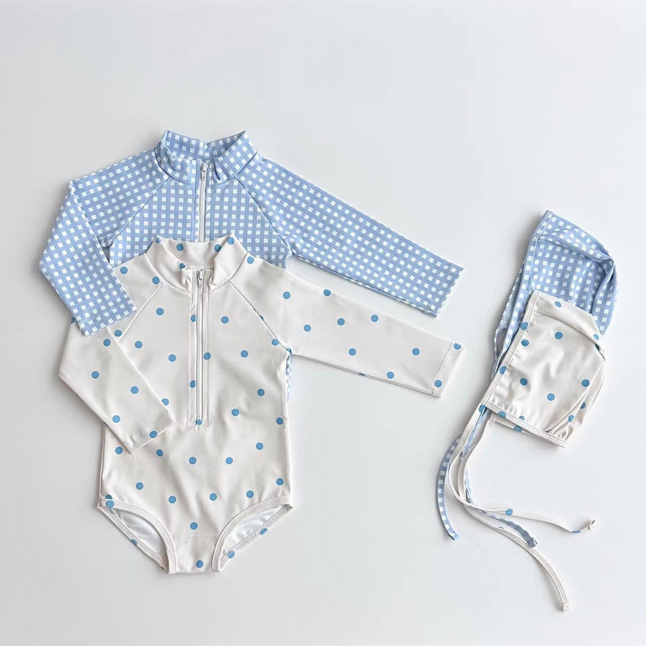 Kids long-sleeve rash guard swimsuit and matching swim cap in blue plaid and polka dots — view 4
