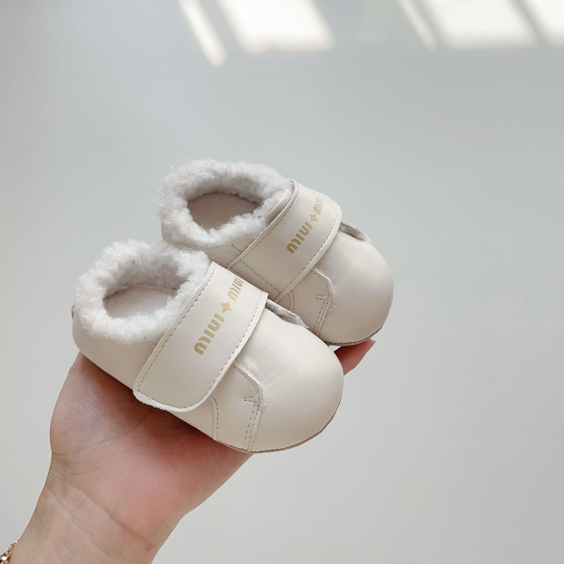 Fleece lined toddler walking shoes with playful letters print and soft sole for winter warmth — view 3