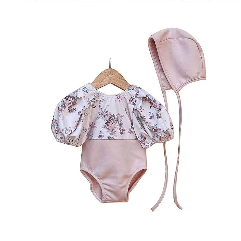 Baby girl pink floral swimwear set with puff sleeves and matching sun protection hat — view 4