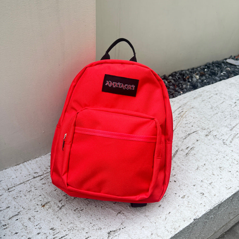 Lightweight children's canvas backpack with letter pattern available in multiple vibrant colors — view 4