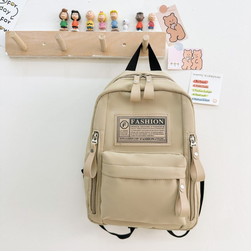 Lightweight canvas preschool backpack for children with letter pattern in multiple colors — view 2