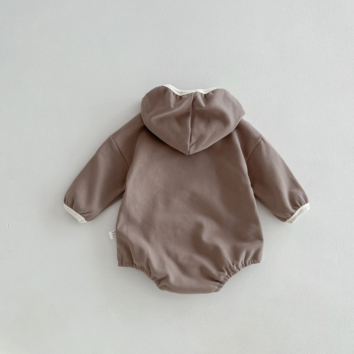 Unisex baby hooded bodysuit in beige cotton with a cute teddy bear pattern — view 4