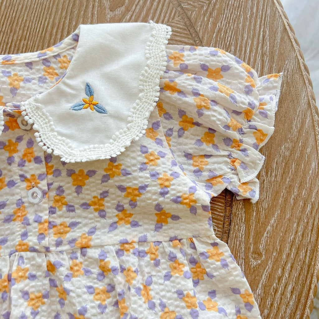 Yellow floral print baby girl bodysuit with an embroidered doll collar made of soft cotton — view 4