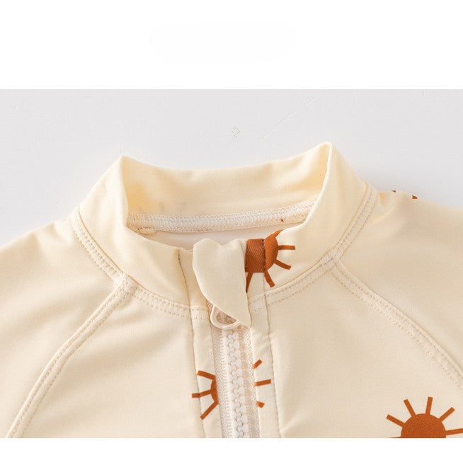 Baby girls zip-up swimwear in earthy floral and polka dot patterns with front zipper detail — view 4