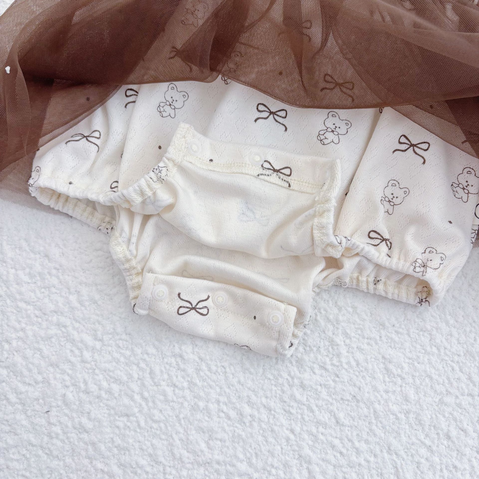 Beige sleeveless baby girl bodysuit featuring a cute teddy bear pattern in soft cotton blend — view 3