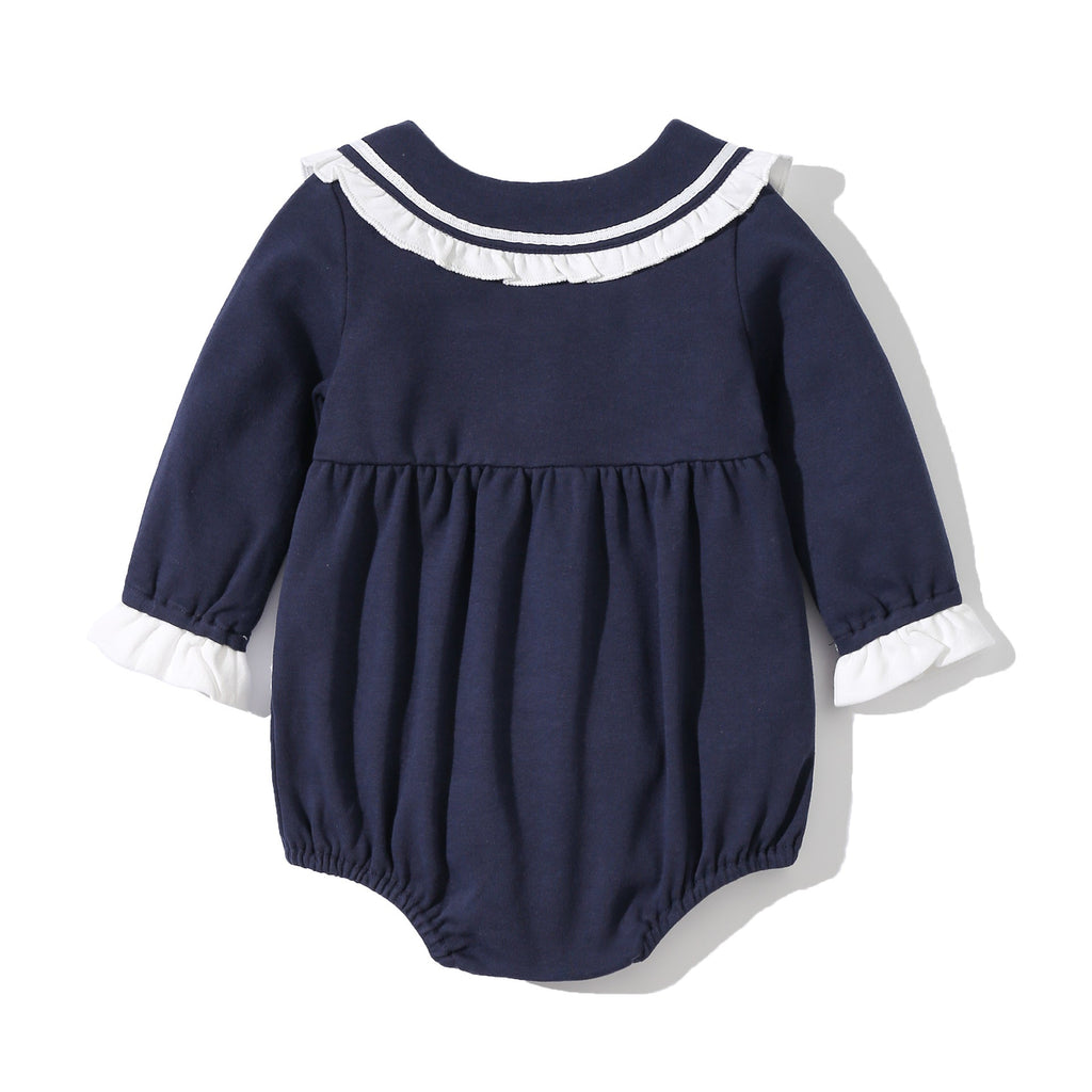Baby girl sailor bodysuit in white and navy blue with a playful tie-dye patched design — view 4