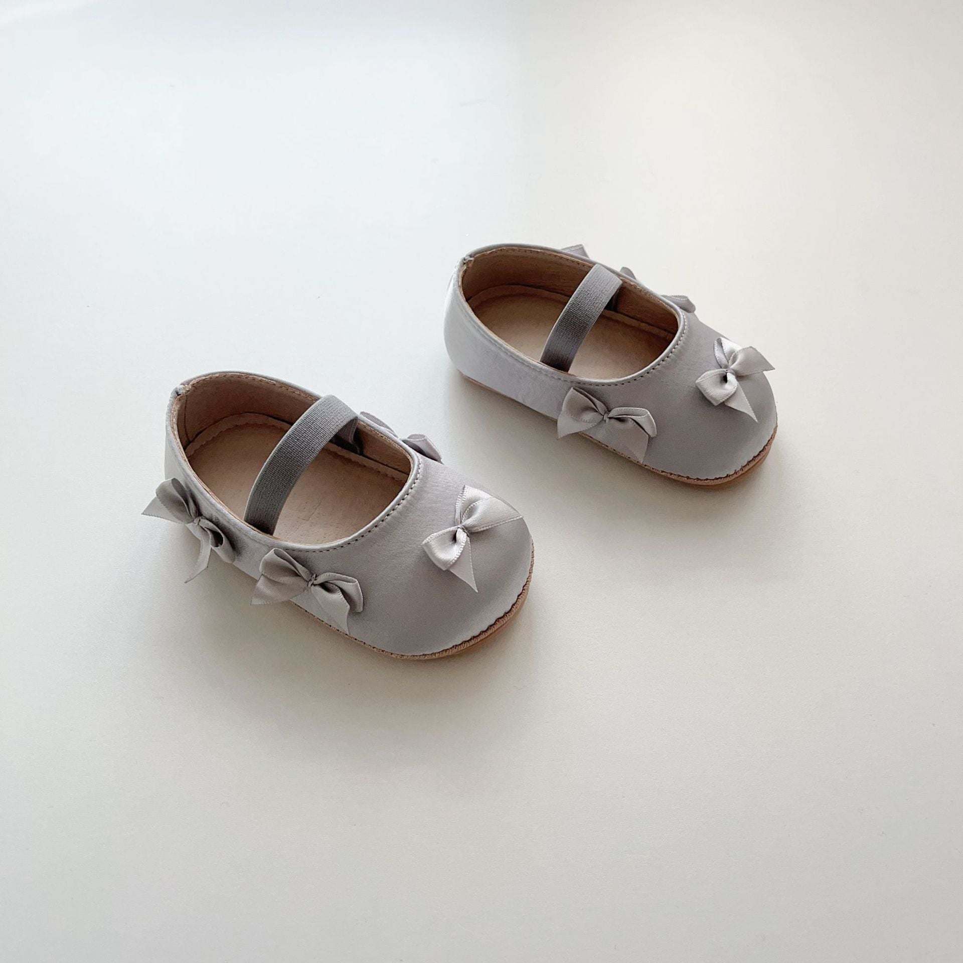 Baby girl butterfly bow shoes in pink with soft polyurethane sole and anti-slip walking grips — view 2