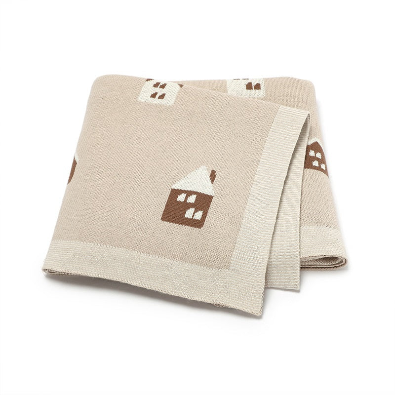 Soft cotton knitted baby blanket featuring a charming little house pattern for newborn nursery decor — view 3