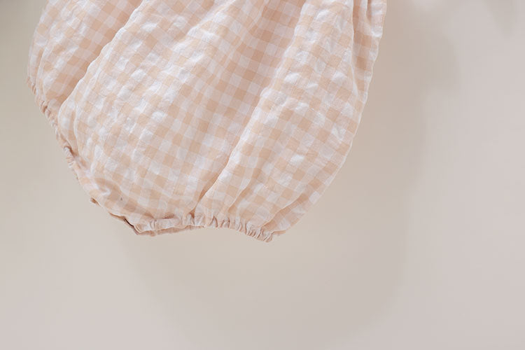 Baby girl beige plaid bodysuit in soft cotton featuring sleeveless design and cute bow tie detail — view 4