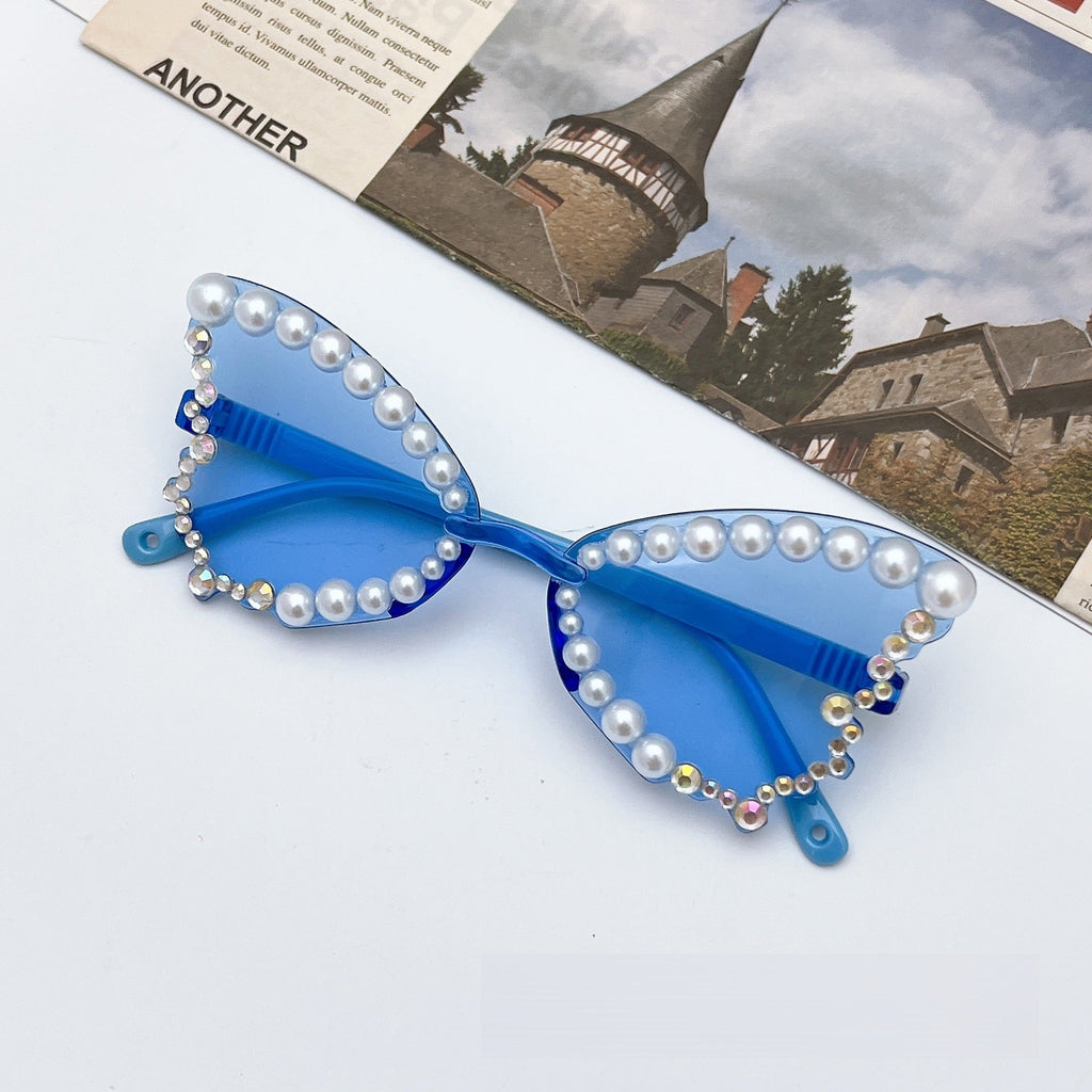 Trendy pearl butterfly sunglasses for girls featuring UV protection lenses and a lightweight elegant frame — view 3