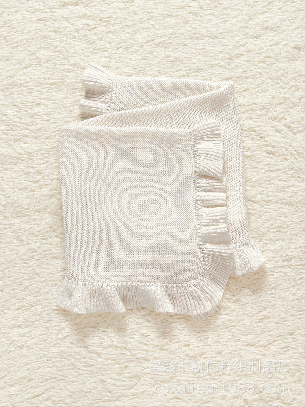 Solid color pure cotton knitted baby blanket featuring an elegant ruffle trim for stylish nursery decor — view 3