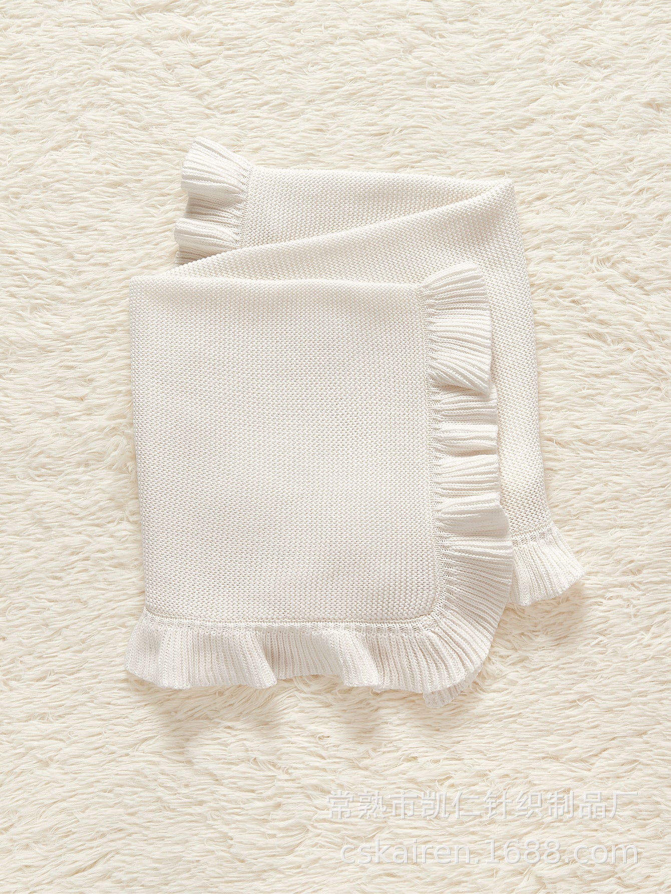 Solid color pure cotton knitted baby blanket featuring an elegant ruffle trim for stylish nursery decor — view 3