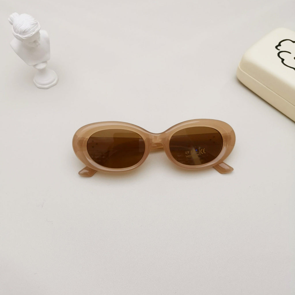 Kids oval beach sunglasses in solid colors featuring lightweight polycarbonate frames and UV protective lenses — view 5