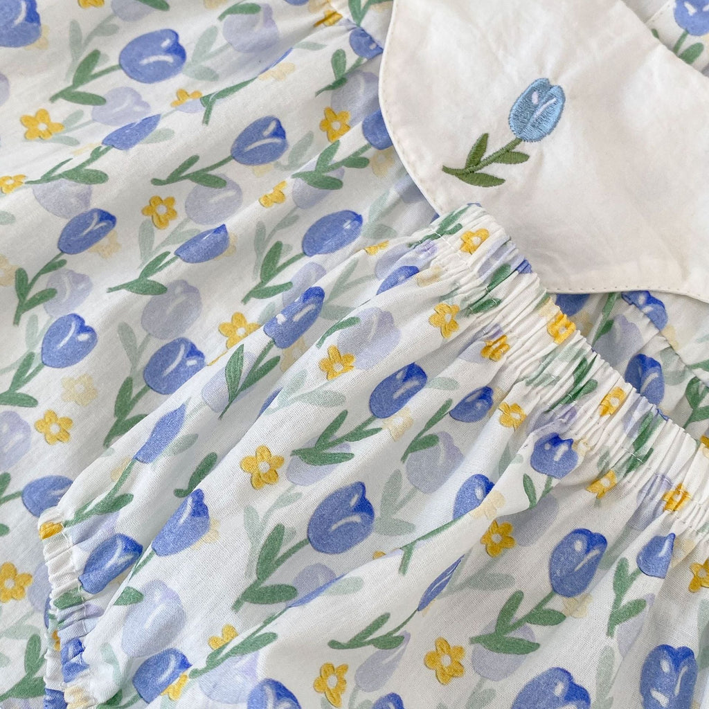 Blue cotton baby clothing set with floral embroidered doll neck top and matching shorts — view 5