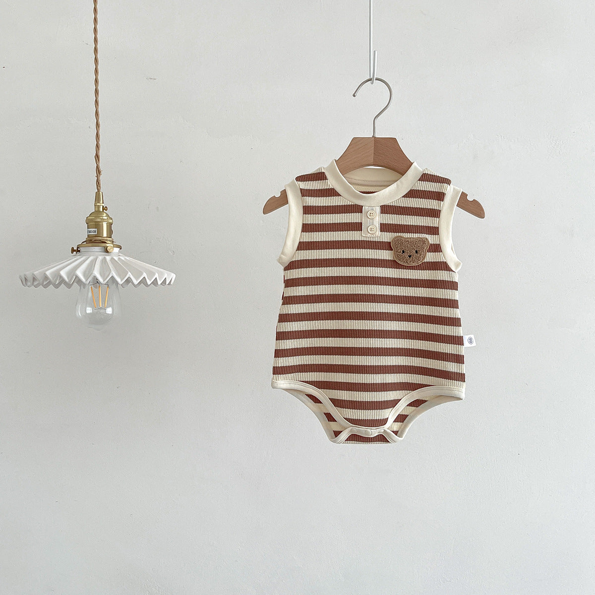 Unisex sleeveless baby bodysuit featuring a striped pattern and teddy bear motif in soft cotton. — view 3