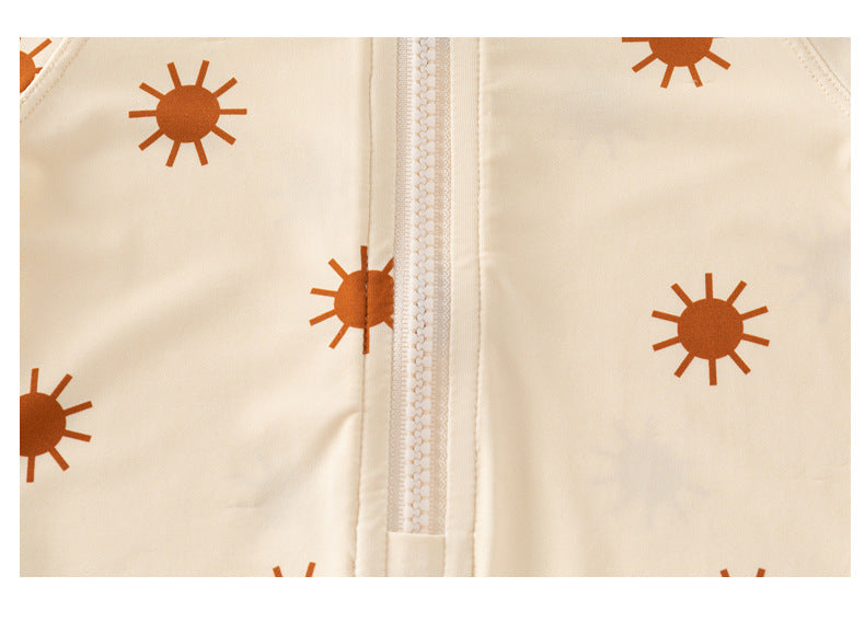Baby girls zip-up swimwear in earthy floral and polka dot patterns with front zipper detail — view 5