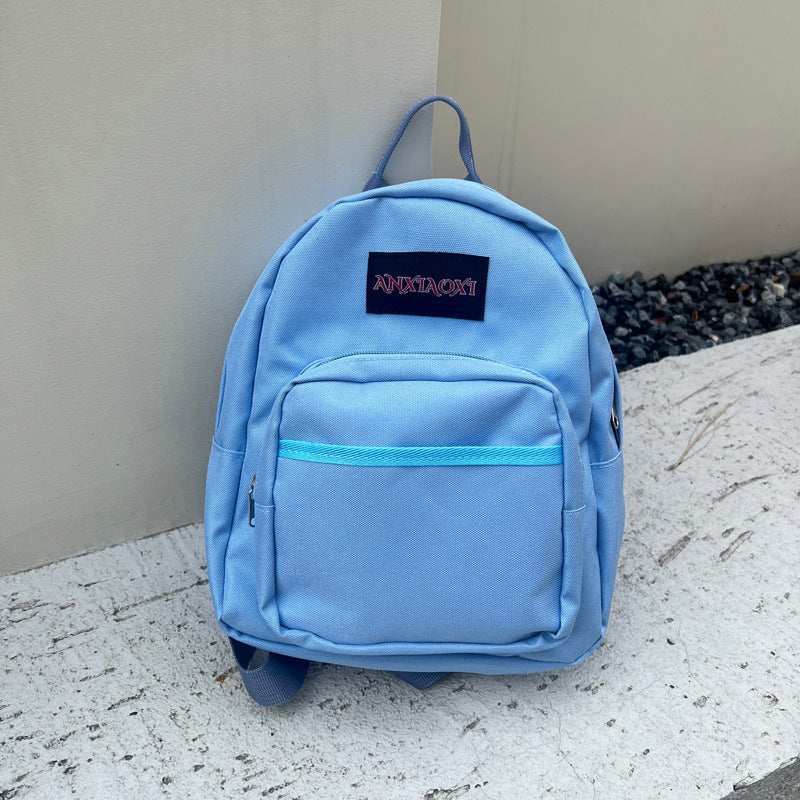 Lightweight children's canvas backpack with letter pattern available in multiple vibrant colors — view 5
