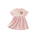 Pink girls summer dress featuring a charming teddy bear and polka dot pattern