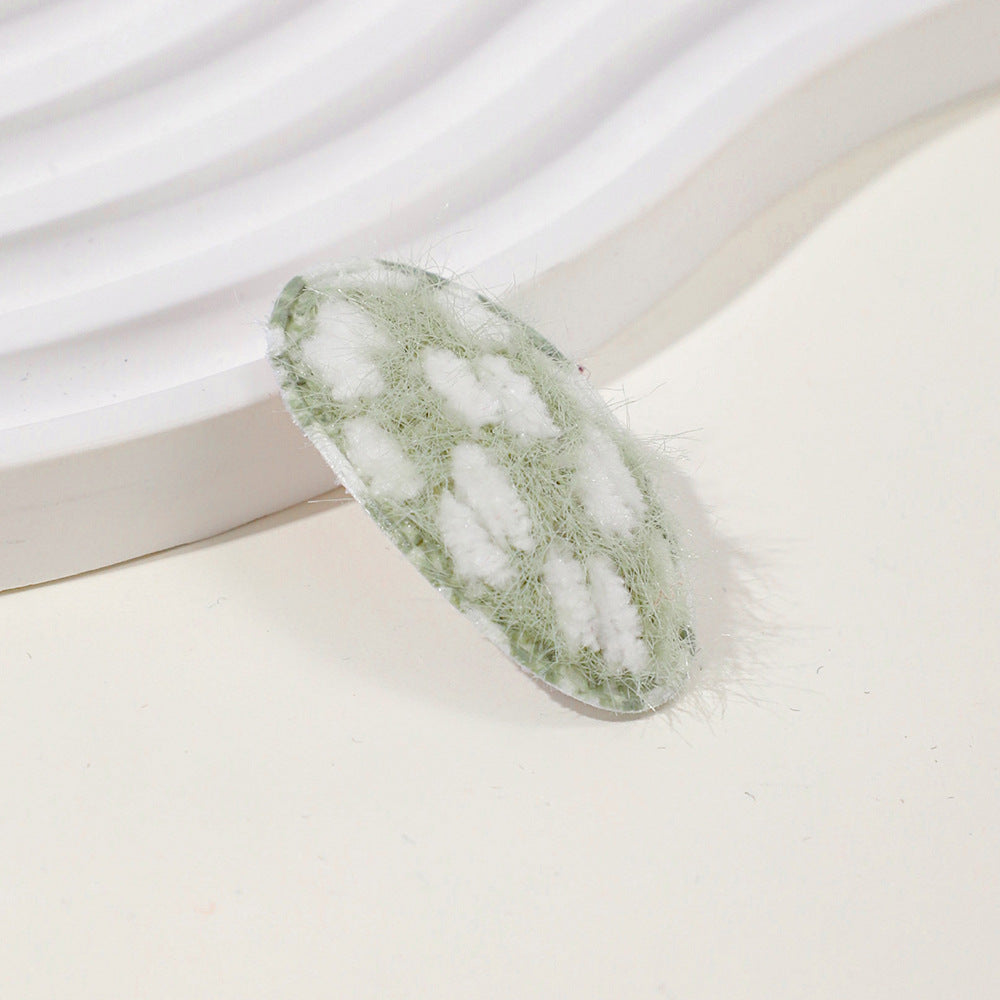 Baby fabric hair clip with cute dotted corn kernel print in soft pastel colors. — view 4