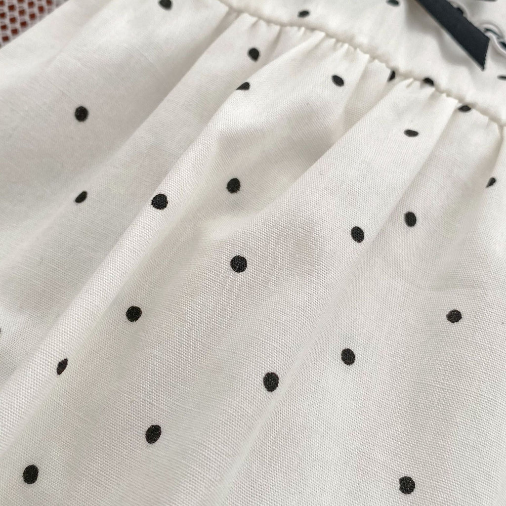 Baby girl polka dot bodysuit in soft white summer cotton with a stylish doll neck — view 5