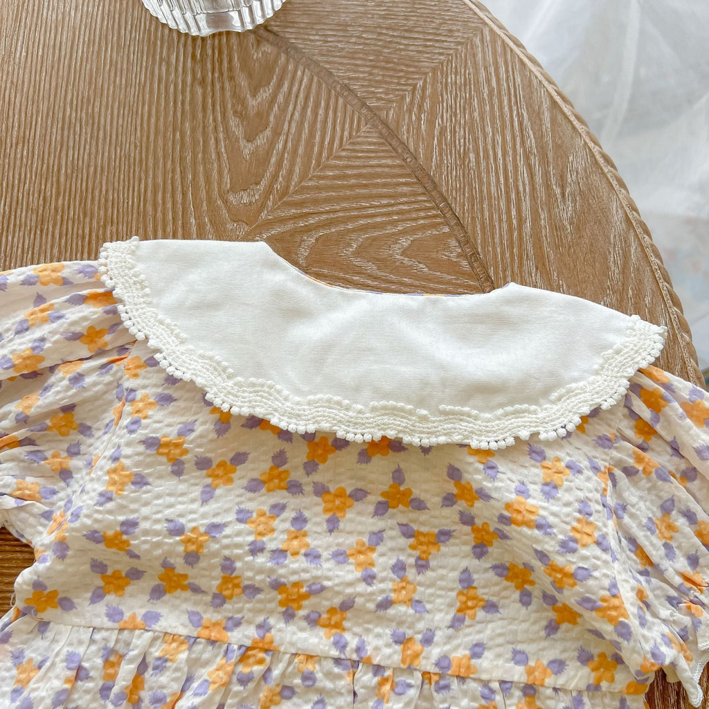 Yellow floral print baby girl bodysuit with an embroidered doll collar made of soft cotton — view 5