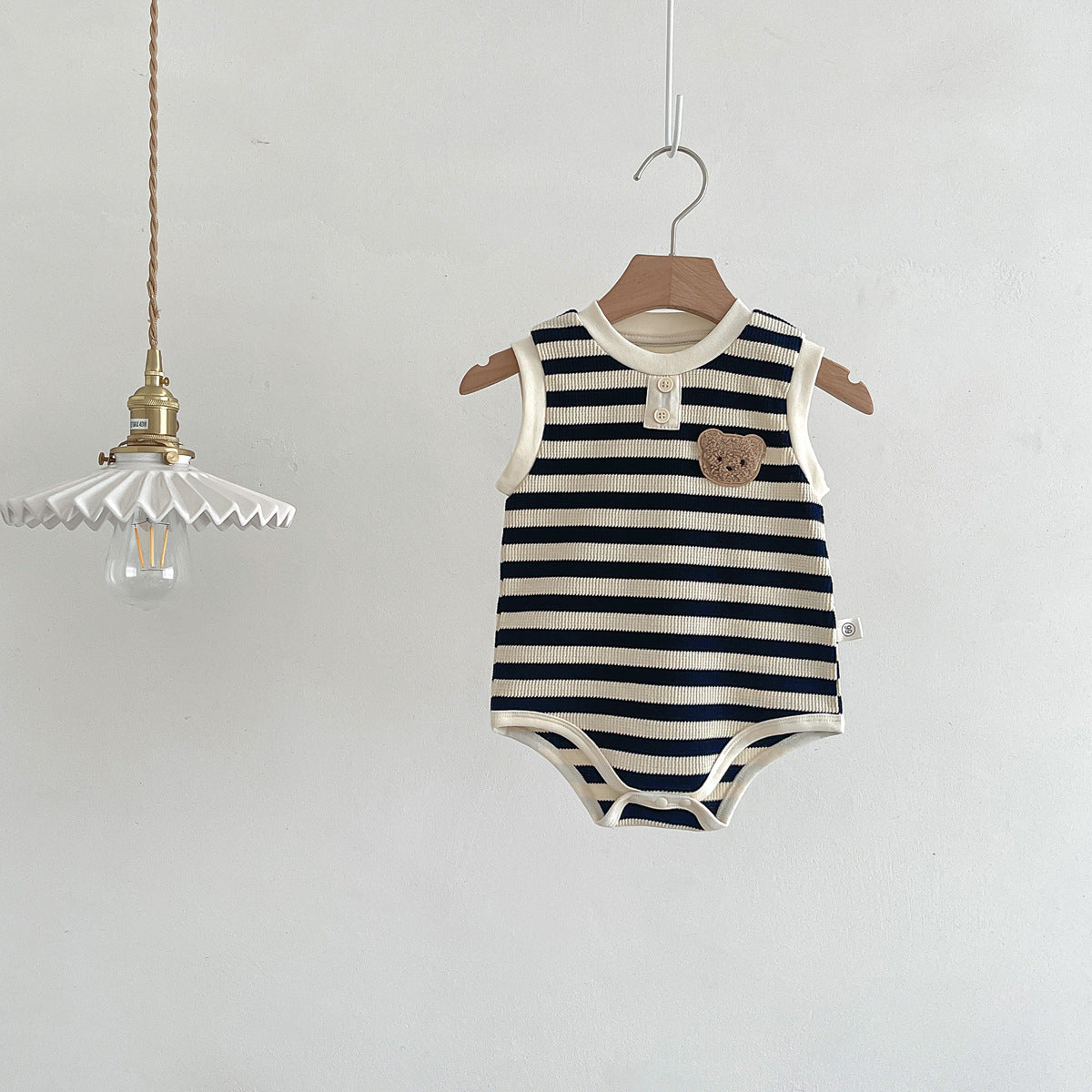 Unisex sleeveless baby bodysuit featuring a striped pattern and teddy bear motif in soft cotton. — view 2