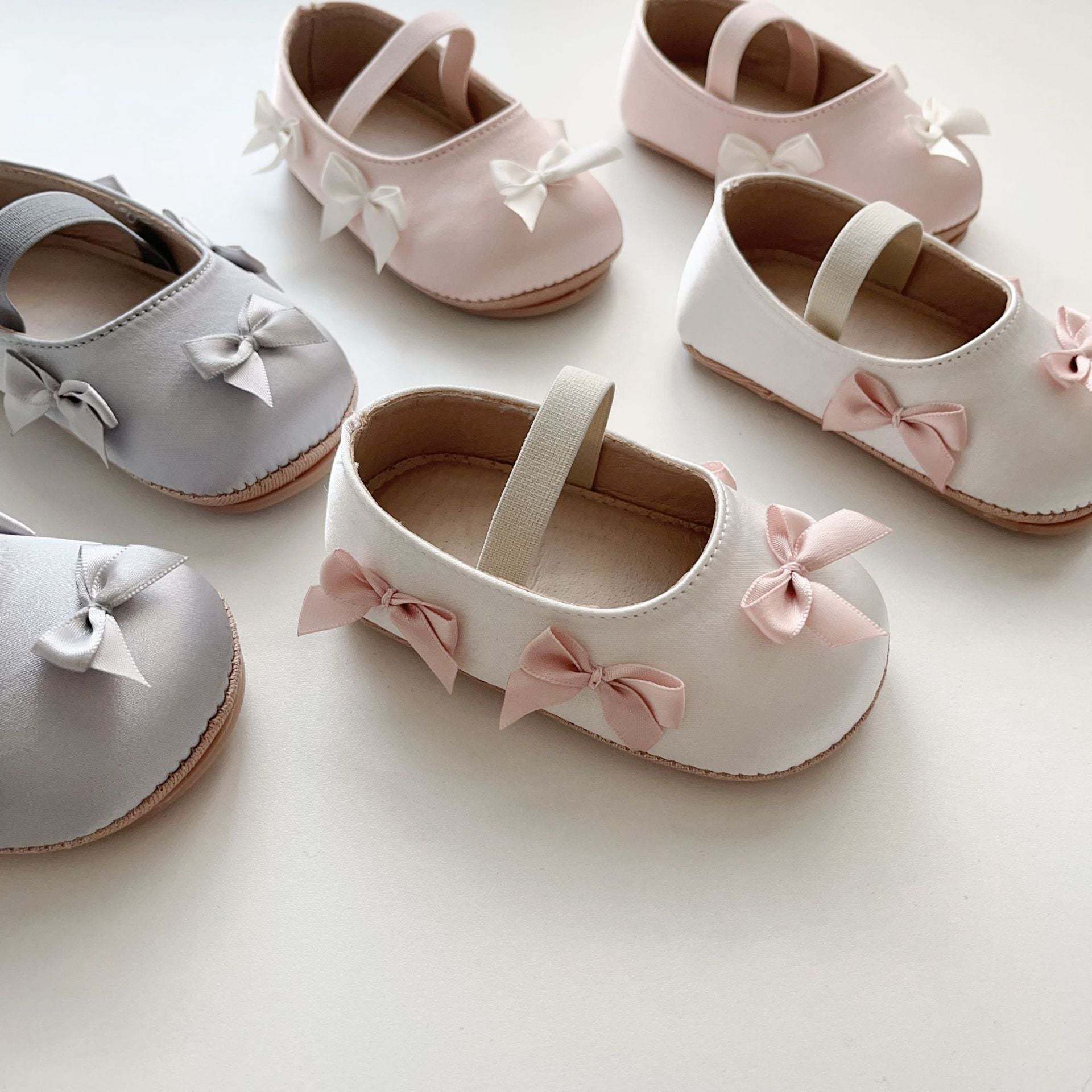 Baby girl butterfly bow shoes in pink with soft polyurethane sole and anti-slip walking grips