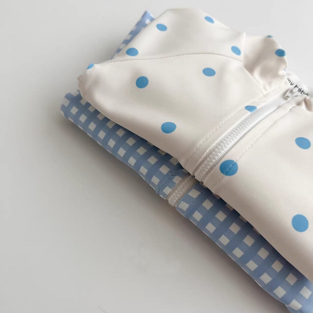 Kids long-sleeve rash guard swimsuit and matching swim cap in blue plaid and polka dots — view 5