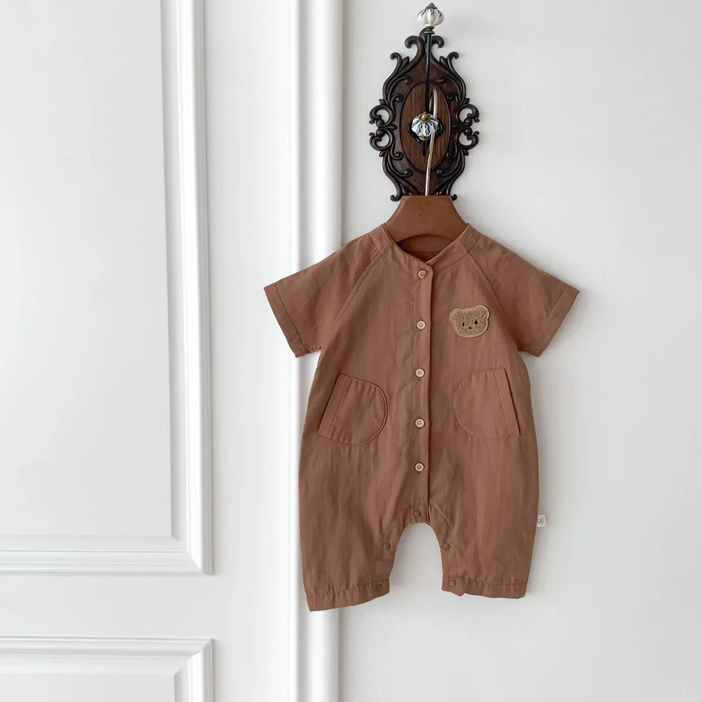 Short sleeve unisex baby teddy bear romper in soft cotton with a single breasted front closure — view 3