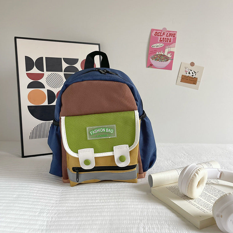 Preschool canvas backpack for children featuring a colorful patchwork design and spacious main storage compartment — view 5