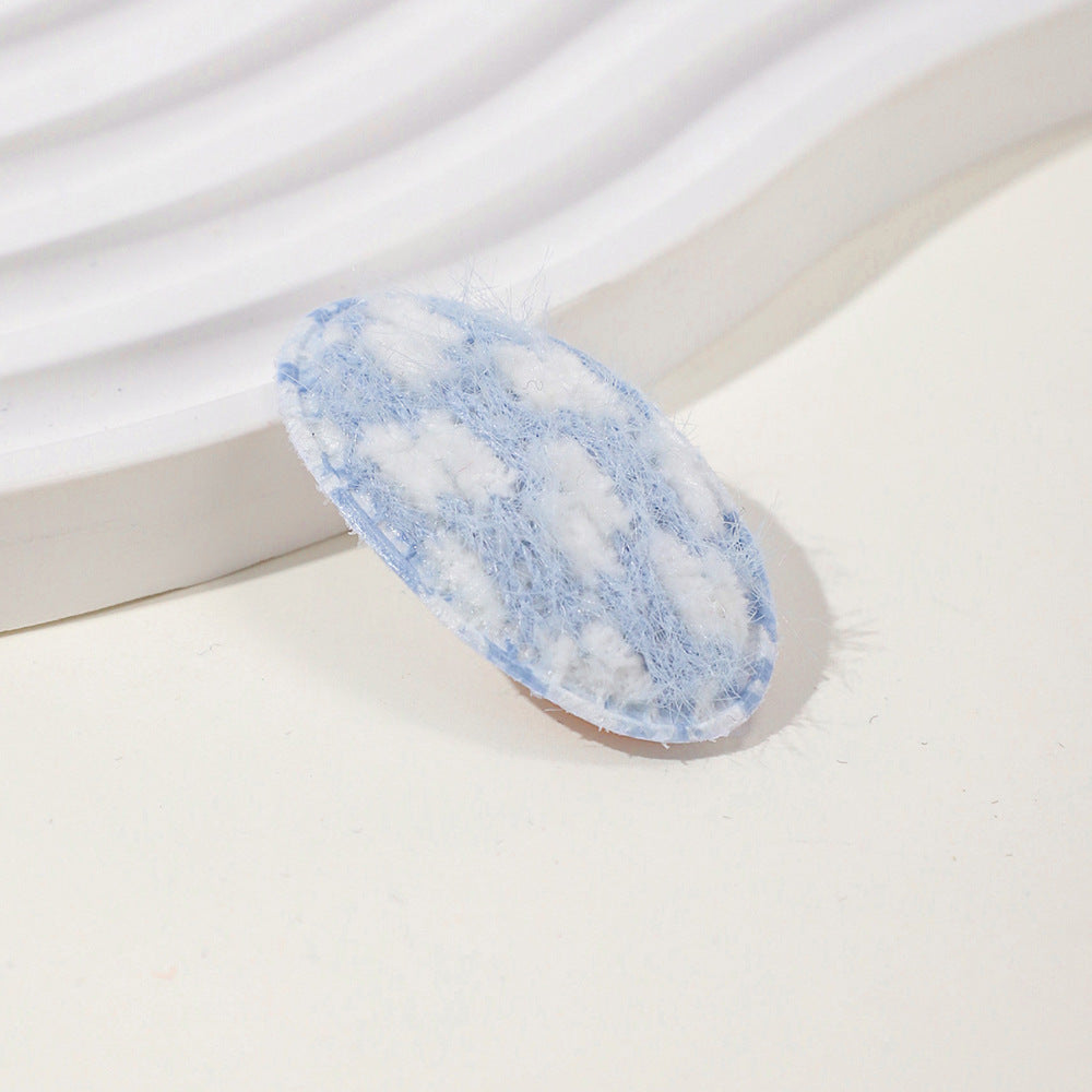 Baby fabric hair clip with cute dotted corn kernel print in soft pastel colors. — view 5