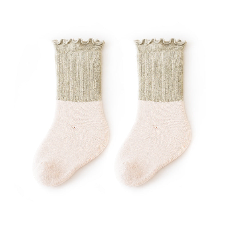 Baby unisex ruffle fringe crew socks in colorful patchwork design made of soft cotton blend — view 5
