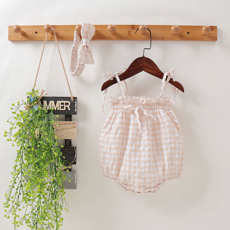 Baby girl beige plaid bodysuit in soft cotton featuring sleeveless design and cute bow tie detail