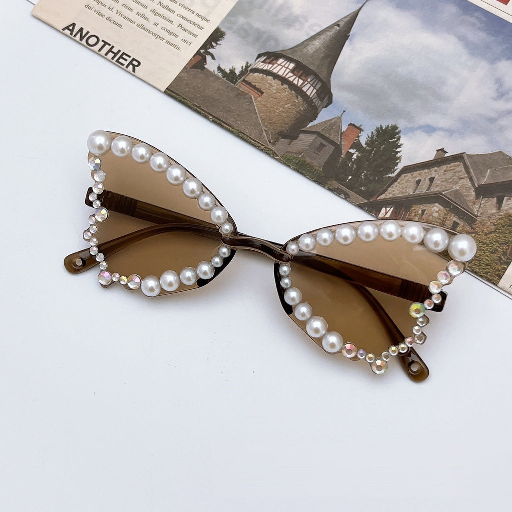 Trendy pearl butterfly sunglasses for girls featuring UV protection lenses and a lightweight elegant frame — view 4