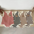Unisex sleeveless baby bodysuit featuring a striped pattern and teddy bear motif in soft cotton.