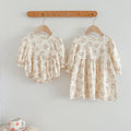Square neck princess baby dress in white cotton with elegant embroidered floral details