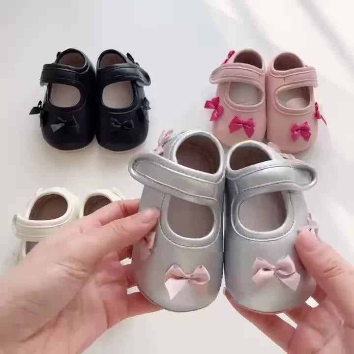 Baby girl walking shoes with butterfly bows and soft anti-slip soles in pink or black