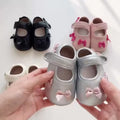 Baby girl walking shoes with butterfly bows and soft anti-slip soles in pink or black