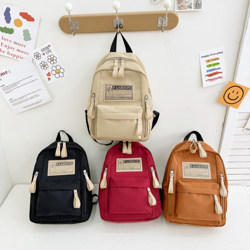 Lightweight canvas preschool backpack for children with letter pattern in multiple colors
