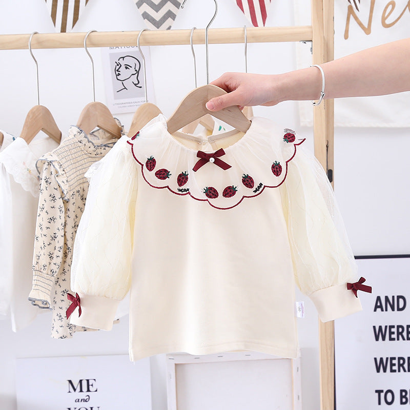 Baby girl apricot cotton shirt with strawberry embroidery, puff sleeves, and front bow patch